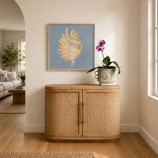 Seashell painting on blue background in a modern coastal home